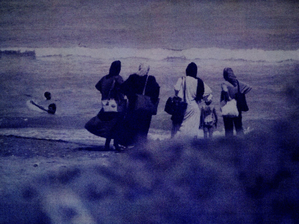 Four women walk in the desert, in a still from Maryam Tafakory's Razeh-del